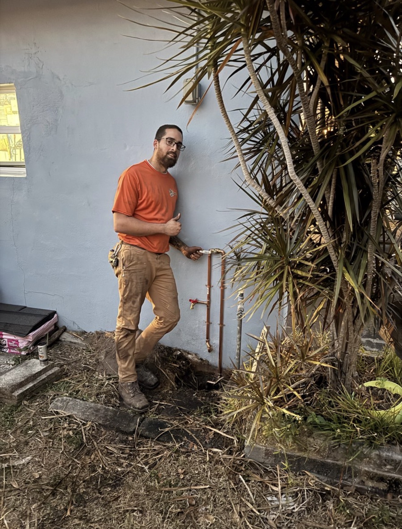 Formula Plumbing technician working on pipe repair job site in Tampa Bay