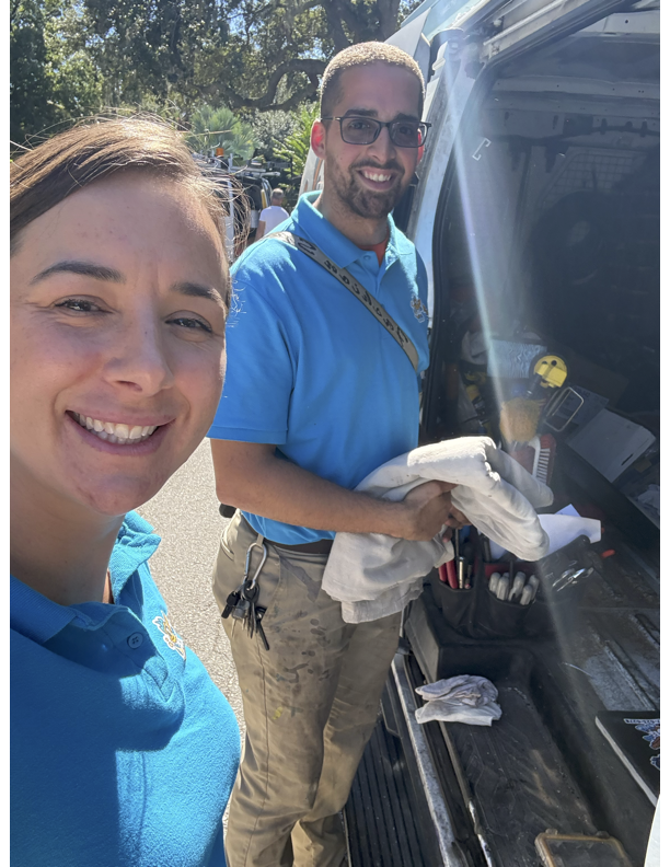 Formula Plumbing employee smiling on the job in Tampa Bay
